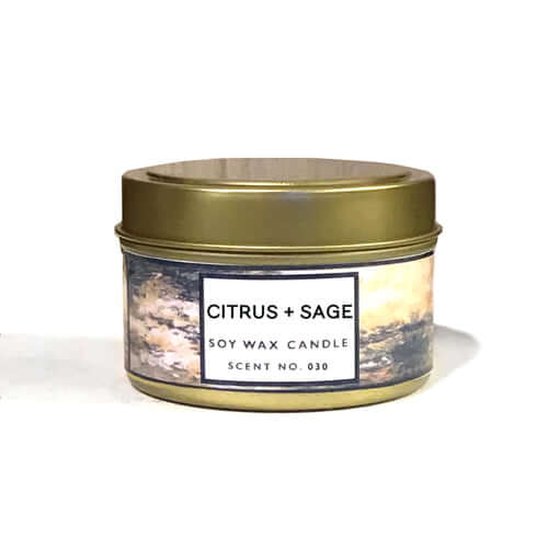 Citrus + Sage Soy Wax Candle in gold tin, featuring bright citrus and herbaceous scents, hand poured and eco-friendly.
