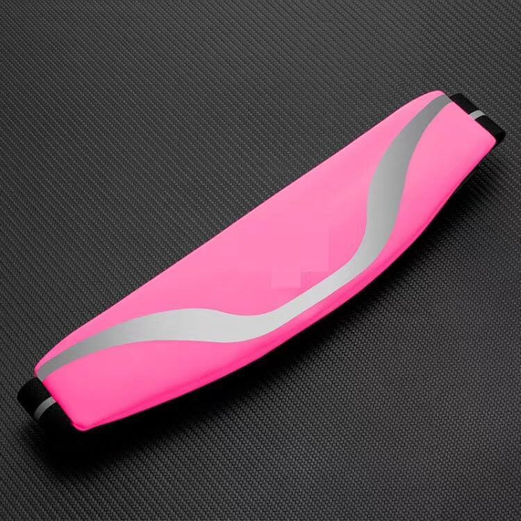 Pink water-resistant sport waist pack running belt with reflective strip for workouts and running.