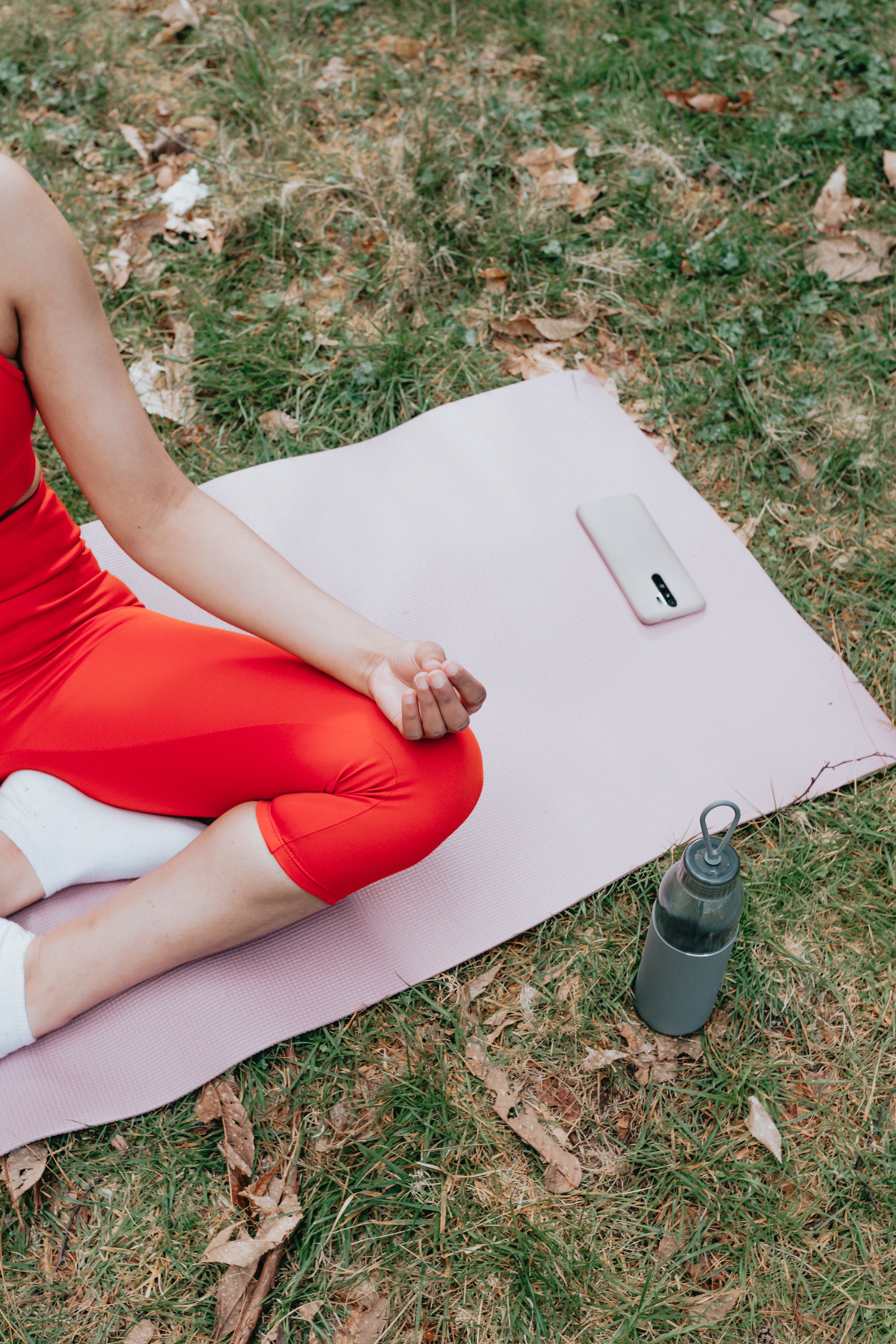 person practicing yoga on a premium non-slip eco-friendly yoga mat outdoors